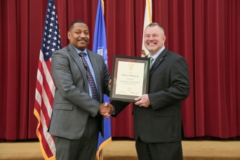 Dr. James Watson Inducted into SES Corps