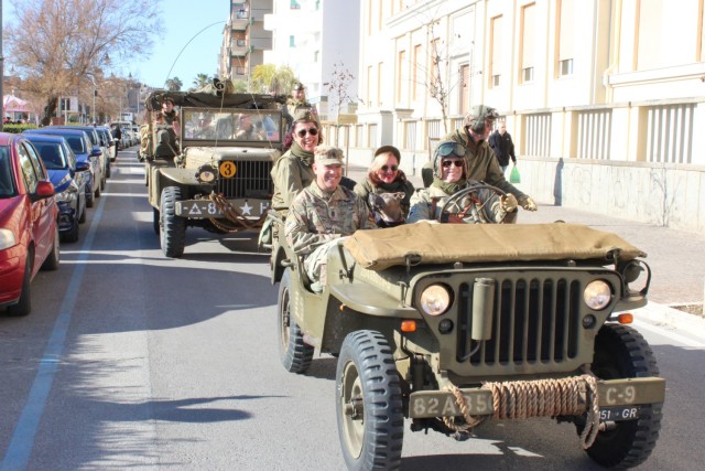 The 2nd Armored Brigade Combat Team, 1st Armored Division, command team Col. Dwight D. Domengeaux and Command Sgt. Maj. Jesus H. Peńa, participate in a military procession through the city of Nettuno honoring the legacy of the soldiers who fought...