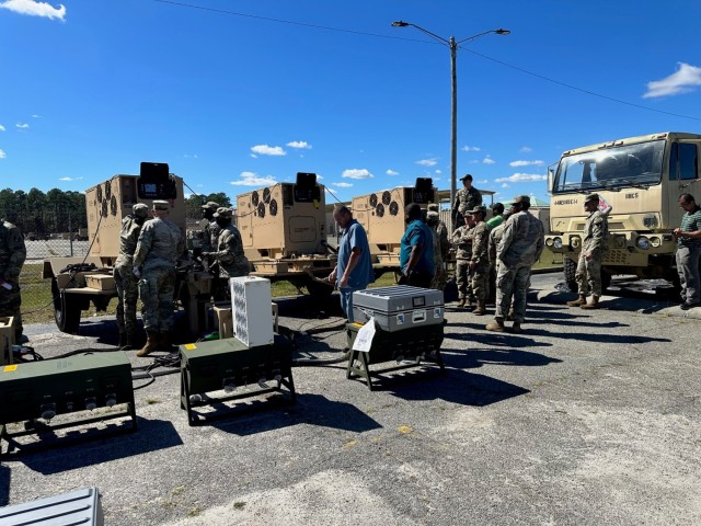 U.S. Army Tactical Power Generator Specialists from the 14th Field Hospital (FH) received training on the Advanced Medium Power Source (AMMPS) 120kW Microgrid System. The training was conducted in preparation for the operational test. conducted by...