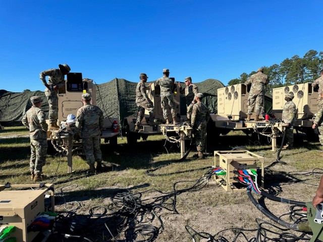 US Army soldiers from the 14th FH following procedures to power the Microgrid System during an operational test conducted by the U.S. Army Test and Evaluation Activity 
at Fort Stewart, Georgia on Nov. 5, 2023.