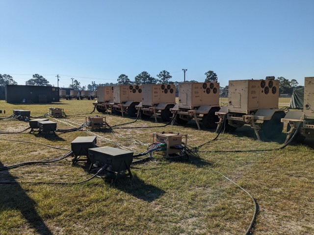Photo of the Advanced Medium Power Source (AMMPS) 120kW Microgrid System ready for power up during an operational test conducted by the U.S. Army Test and Evaluation Activity at Fort Stewart, Georgia on Nov. 5, 2023.
