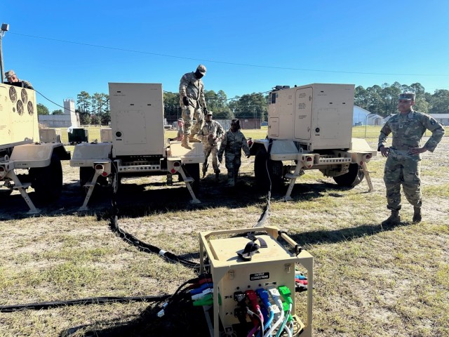 US Army soldiers from the 14th FH completing the final setup of the Microgrid System during  an operational test conducted by the U.S. Army Test and Evaluation Activity 
at Fort Stewart, Georgia on Nov. 5, 2023.