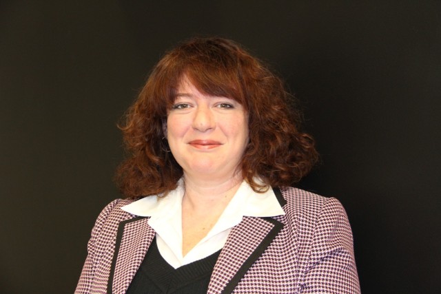 Erica Bertoli, the workforce and community outreach lead for U.S. Army Combat Capabilities Development Command, or DEVCOM, Command, Control, Communications, Computers, Cyber, Intelligence, Surveillance and Reconnaissance Center, poses for a photo following her nomination as a finalist for the ATHENA Leadership Award Jan. 19, 2024, at Aberdeen Proving Ground, Maryland. ATHENA Leadership Award winners will be announced March 1, 2024. 