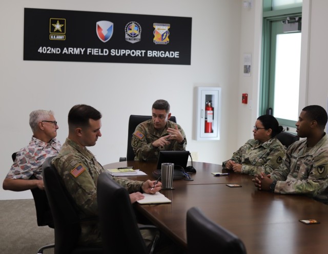 Lt. Col. Mark Yore leads Capt. Robert Rendle, Capt. Maurice Williams, Chief Warrant Officer 4 Midge Chacon, and Robert Curran in an after action review of Talisman Sabre 23 at 402nd Army Field Service Brigade headquarters at Fort Shafter, Hawaii, Nov. 7, 2023.