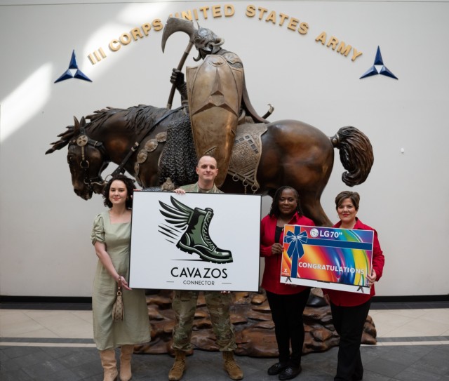 
Staff Sgt. Matthew Johnson, 11th Signal Brigade, proudly displays the winning logo for the Cavazos Connector project on Jan. 10. 