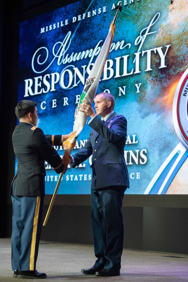 Air Force Lt. Gen. Heath Collins receives the Missile Defense Agency colors during a ceremony Jan. 24 at Redstone Arsenal, signifying his assumption of responsibility as the 12th director of MDA.