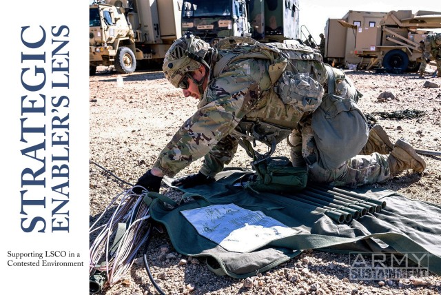 Cpl. Brandon McCray, a signal support systems specialist assigned to the 87th Division Sustainment Support Battalion, 3rd Division Sustainment Brigade, 3rd Infantry Division, sets up communications equipment during the National Training Center rotation 23-05 at Fort Irwin, California, March 2, 2023.