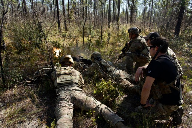 Green Berets from 7th Special Forces Group (Airborne) train and advise Soldiers assigned to 4/54 Security Force Assistant Brigade on small unit tactics and land navigation on Camp “Bull” Simons, Florida, Nov. 5, 2023. 