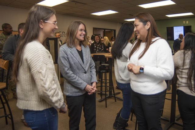 Vanessa Arzabala (right), a military spouse and Truman Army Education and Personnel Testing Center guidance counselor – who will help operate the new Fort Leonard Wood Spouse Resource Center – speaks with health experts from the Armed Forces...
