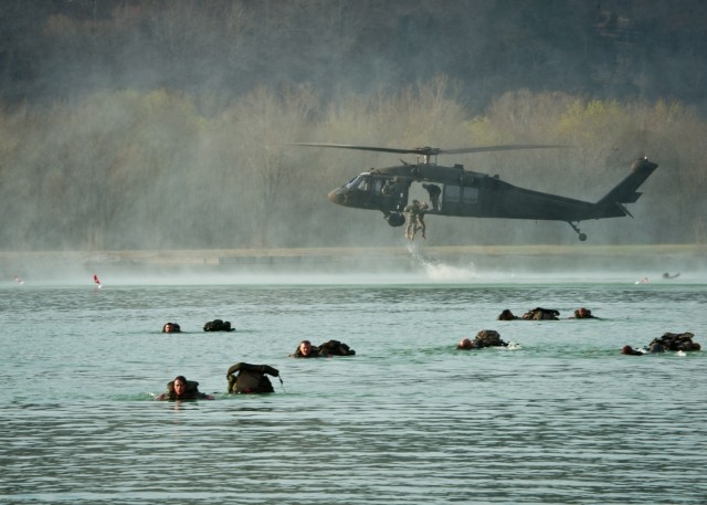 Service members helocast and then swim to shore at Training Area 250 during the 2011 Best Sapper Competition, hosted by the U.S. Army Engineer School. Helocasting is a common element during the competition each year, weather permitting. This...