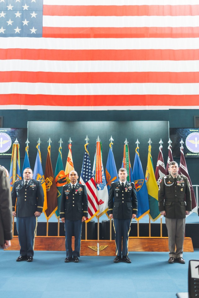 Capt. Marc J. Taylor, Chief Warrant Officer 5 Immanuel Delacruz, Chief Warrant Officer 4 Seth Armstrong, and Sgt. 1st Class Erich G. Schmitt were honored together at a retirement ceremony inside the Army Aviation Museum on Feb. 2, 2024.