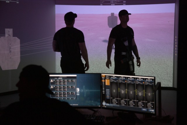 Green Berets with 10th Special Forces Group (Airborne) acclimate to the VirTra simulator before starting an iteration of training on Fort Carson, Colorado, Feb. 2, 2024. The VirTra simulator features technology that can present different scenarios...