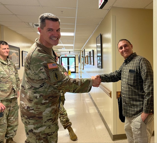 SATMO Commander Col. Holmes (L) recognizes USASAC Safety Officer Franz Thomas for providing an OSHA 10 class for Soldiers during a SATMO command inspection.
