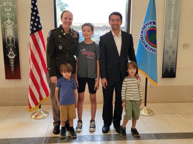 Nebraska Army National Guard Maj. Jessica Pan poses with her husband and three children after her promotion ceremony to the rank of major, Feb. 22, 2023, at the U.S. Embassy in Kigali, Rwanda. Pan was named as the U.S. Africa Command Bilateral Affairs Officer of the Year for 2023. (Photo courtesy of Maj. Jessica Pan)
