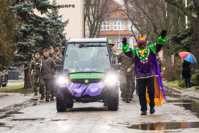 Command Sgt. Maj. Verdis Walker, 773rd Military Police Battalion senior enlisted advisor, and Haughton, Louisiana native, leads the very first Mardi Gras parade across Camp Kosciuszko in Poznan, Poland, Feb. 9, 2024. The 773rd MP Bn., a Louisiana...