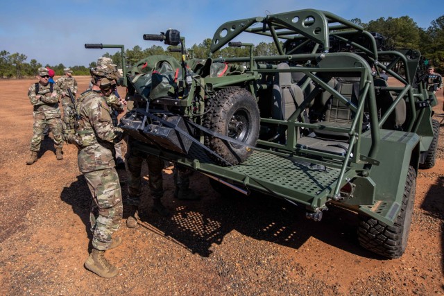 Technology and industry leaders unload and set-up their concepts to demonstrate their submissions, Feb. 2, 2024, at McKenna Range, Fort Moore, Ga. The Silent Tactical Energy Enhanced Dismount is an all-terrain, electric payload mobility platform...