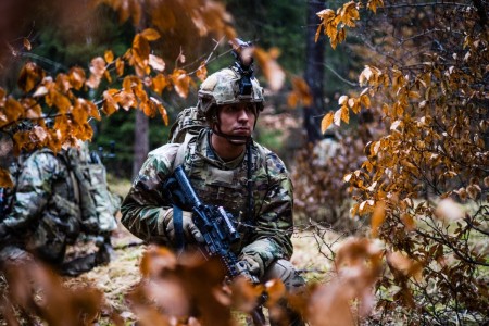 Spc. Christopher Condran attached to 2nd Cavalry Regiment, 2nd squadron, secures the perimeter during a Simulated Training Exercise held by 2CR at Vilseck, Germany, Feb. 7, 2024. During the STX Soldiers engage in platoon-level training within field and urban environments, enhancing their combat readiness and team cohesion. 