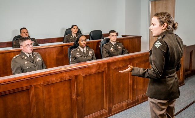 Female military lawyer talks to jury