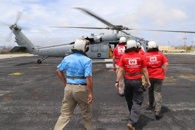 The US Army Corps of Engineers Temporary Roof Team, Debris Planning Response Team, and a FEMA public assistance liaison, board a MH60 Sierra to perform an aerial survey of affected homes and infrastructure following Typhoon Mawar May 31 from Guam Naval Base. USACE is working in partnership with the local and federal partners in response to Typhoon Mawar. USACE has received FEMA mission assignments for Regional Activation, Temporary Emergency Power, Temporary Roofing Planning, and Debris Management support.