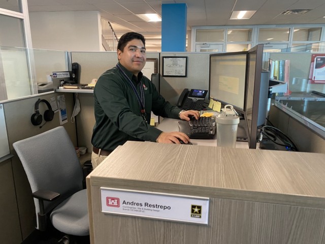 Andres Restrepo working at his desk at TAM headquarters.