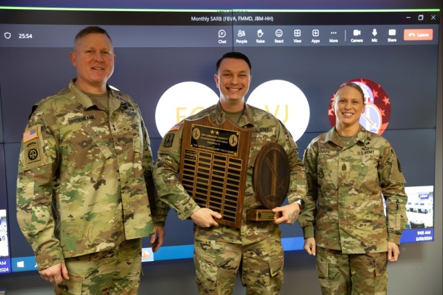 Staff Sgt. Stephen Hughes, a career counselor assigned to Fort Meade, receives the Retention Excellence Award from the U.S. Army Military District of Washington command team at Fort McNair, Washington, D.C., Feb. 20, 2024. The award recognizes the U.S. Army Field Band accomplishing their retention mission in all categories, resulting in a 168% retention rate. Recently, Hughes was named the U.S. Army Military District of Washington’s Career Counselor of the Year.