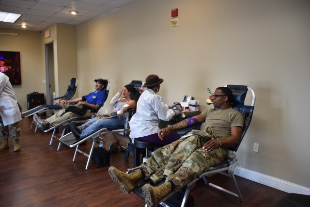 Benito Lopez, Fort Cavazos special projects technician, Kamiliani Narcis, resident services coordinator for Cavalry Family Housing, and Sgt. 1st Class Michael Copeland Jr., 615th Aviation Support Battalion, 1st Air Cavalry Brigade, and community...