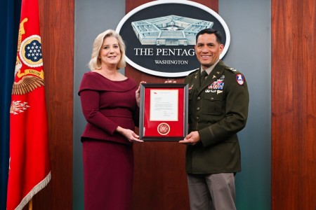 Secretary of the Army Christine Wormuth presents the Army Astronaut Device to Col. Frank Rubio during a pinning ceremony at the Pentagon Press Briefing Room, Feb. 22, 2024.