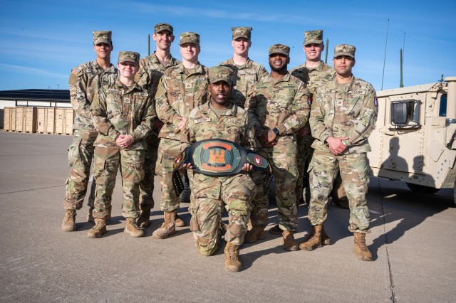 Winners of the 36th Engineer Brigade’s Best Squad Competition from the 5th Engineer Battalion pose for a photo after being recognized by battalion leadership during a unit formation Feb. 15 in the unit’s motor pool.