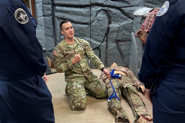 Staff Sgt. Jacob Whitlock, a Combat Medic Specialist Training Program instructor at Fort Sam Houston, Texas, demonstrates hemorrhage-control concepts to junior ROTC cadets. Whitlock is the lead instructor for applying the &#34;whole blood&#34; shock treatment, where combat medics use blood transfusions to resuscitate patients. 
