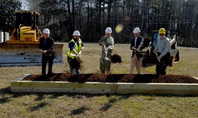 Taking part in a groundbreaking ceremony Feb. 21 for a new Food, Beverage and Entertainment Center at Redstone are, from left, Derrick Gould, director of the Garrison’s Family and Morale, Welfare and Recreation; Chris Hughes, superintendent at...