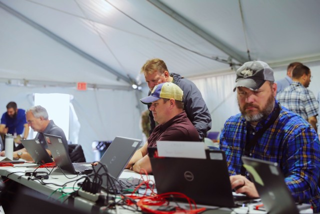 Subject matter experts with the Table of Knowledge assess observations for projected insights during the second week of Project Convergence – Capstone 4 at Camp Pendleton, Calif., Feb. 29, 2024. 