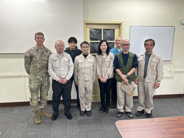 Col. Marcus Hunter, left, U.S. Army Garrison Japan commander, poses with members of the garrison&#39;s Directorate of Public Works team during a recent two-day trip to the Kure Ammunition District in Hiroshima, Japan. Hunter thanked the members...