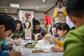 Soldiers from Camp Humphreys volunteer at a local orphanage