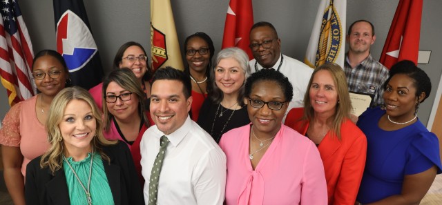 Twelve IMCOM professionals graduate from CES Intermediate Course. First row, from left, Regina Martinez, Jaime Ruiz, Andrea Burton. Second row, from left, Marilynn Rivera-Santiago, Darlene Pantoja, Brenda Bailey, Senitta Conyers. Third row, from...
