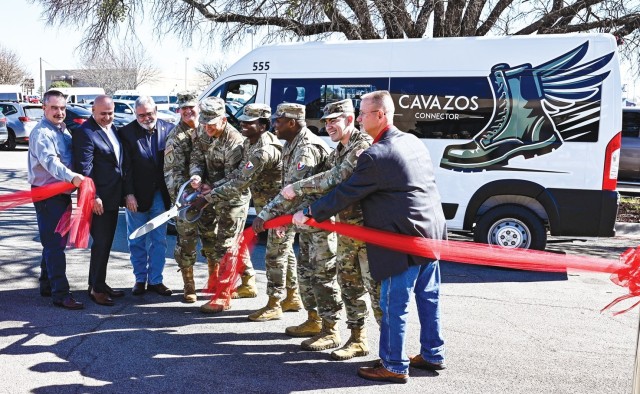 Fort Cavazos leadership, civic leaders and representatives of the Hill Country Transit District cut the ribbon signifying the launch of the Cavazos Connector March 2, 2024, at the Community Events Center. (U.S. Army photo by Darren Cinatl, Fort...