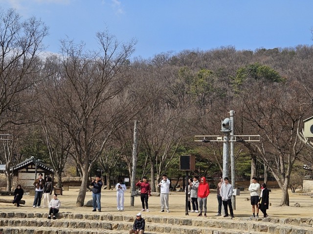 U.S. Army Soldiers assigned to 2-2 Assault Helicopter Battalion participate in a Community Relations (COMREL) tour at Yongin Folk Village on March 7, 2024. The group receive an introduction to K-16 facilities and programs before having lunch...