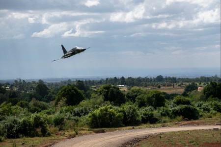 A Kenya Air Force pilot conducts a capabilities fly-by in an F-5E during Justified Accord 2024 (JA24) at the Counter Insurgency Terrorism and Stability Operations Training Centre, Nanyuki, Kenya, March 5, 2024. JA24 is U.S. Africa Command&#39;s largest exercise in East Africa, running from Feb. 26 - March 7. Led by U.S. Army Southern European Task Force, Africa (SETAF-AF), and hosted in Kenya, this year&#39;s exercise will incorporate personnel and units from 23 nations. This multinational exercise builds readiness for the U.S. joint force, prepares regional partners for UN and AU mandated missions, and increases multinational interoperability in support of humanitarian assistance, disaster response and crisis response.