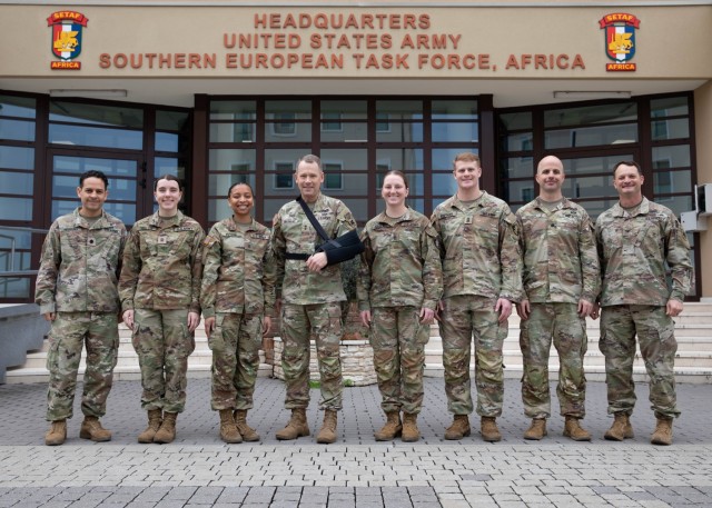 From left, West Point Lt. Col. Christian Robbins, cadet Kacy Colletto, cadet Maya Peyton, Maj. Gen. Todd R. Wasmund, cadet Elizabeth Caldwell, cadet Trey Stephens, Lt. Col. Adam Brady, and Col. Robert Hilliard pose for a photo during a visit at...