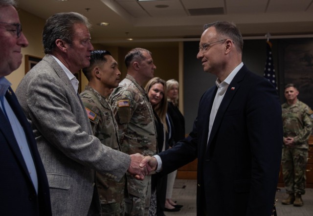 Polish President Andzrej Duda shakes hands with 3rd Infantry Division (3ID) leadership during his visit to Fort Stewart, Georgia, March 13, 2024. The 3ID’s mission is to train alongside our Allies and partners to present a credible, interoperable force, capable of countering any adversary. (U.S. Army photo by Pfc. Rebeca Soria)