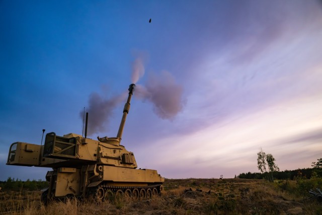 An artillery round is fired from a M109A6 Paladin, assigned to 3rd Battalion, 16th Field Artillery Regiment, supporting 4th Infantry Division, during NATO training exercise Barbara’s Determination near Pabrade, Lithuania, July 13, 2023. 