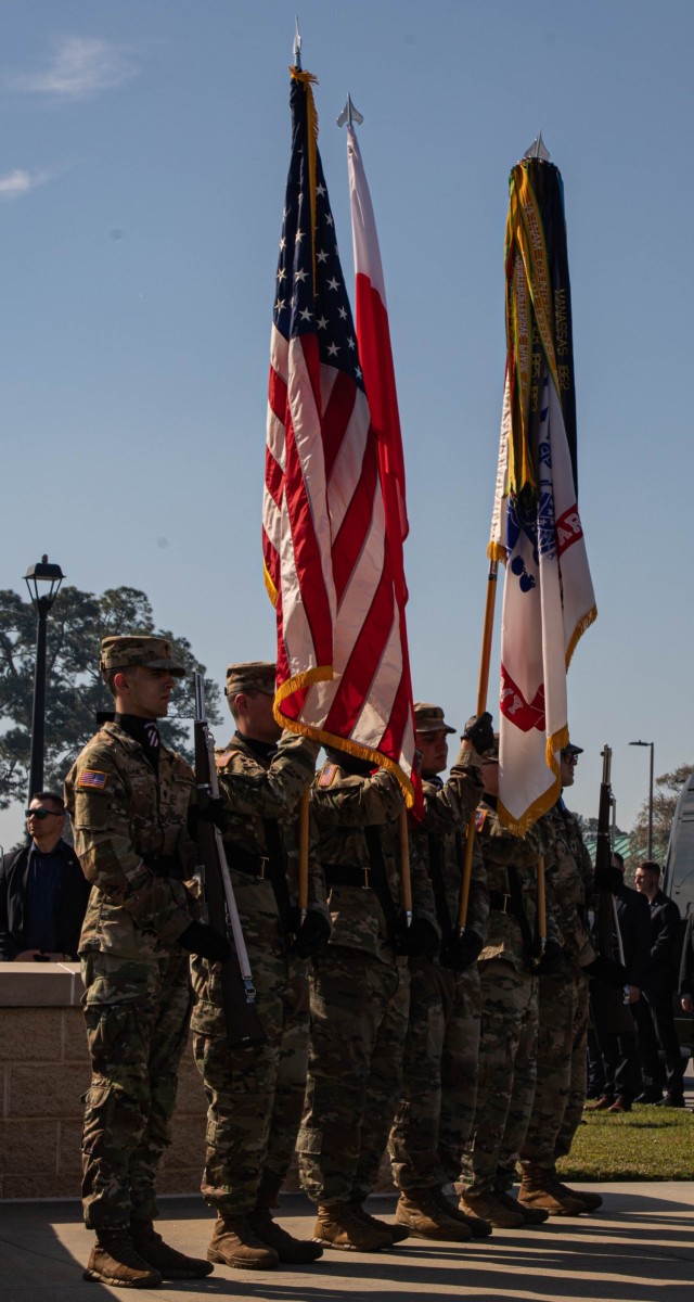 The 3rd Infantry Division Color Guard stands at attention during Polish President Andzrej Duda visit at Fort Stewart, Georgia, March 13, 2024. The 3rd Infantry Division’s mission is to train alongside our Allies and partners to present a credible, interoperable force, capable of countering any adversary. (U.S. Army photo by Pfc. Rebeca Soria)