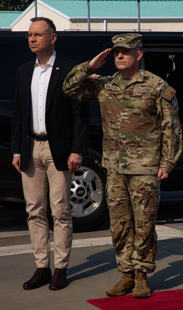 Polish President Andzrej Duda observes the National Anthem with U.S. Army Brig. Gen. Jeremy Wilson, 3rd Infantry Division’s Deputy Commanding General of Maneuver at Fort Stewart, Georgia, March 13, 2024. Duda’s visit comes as multiple 3rd Infantry Division units are currently deployed in the Baltic region as part of the strong unremitting U.S. commitment to NATO. (U.S. Army photo by Pfc. Rebeca Soria)