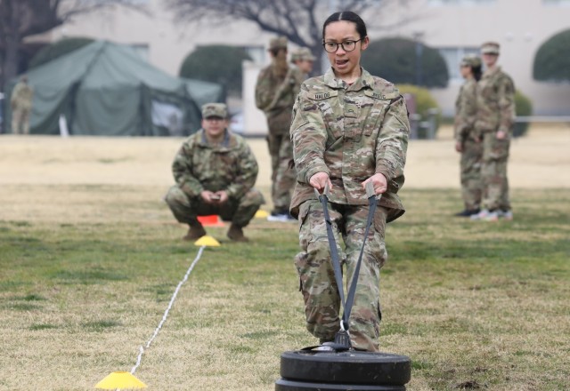 Cadet Gianna Halog performs the sprint-drag-carry event as she takes the Army Combat Fitness Test at Camp Zama, Japan, March 12, 2024. Soldiers from the 35th Combat Sustainment Support Battalion hosted a field day to familiarize Zama Middle High...