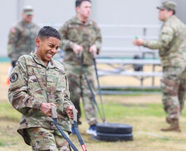 Cadet Ian Leon Quinones performs the sprint-drag-carry event as he takes the Army Combat Fitness Test at Camp Zama, Japan, March 12, 2024. Soldiers from the 35th Combat Sustainment Support Battalion hosted a field day to familiarize Zama Middle...