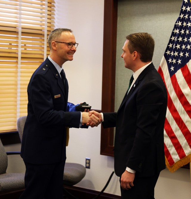 Brig. Gen. Kenneth Borchers, left, director of the Joint Staff, Washington National Guard, shakes hands with Ruslan Kravchenko, head of the Kyiv Regional State Administration, during a visit to Camp Murray, Wash., March 15, 2024. The visit to Camp...