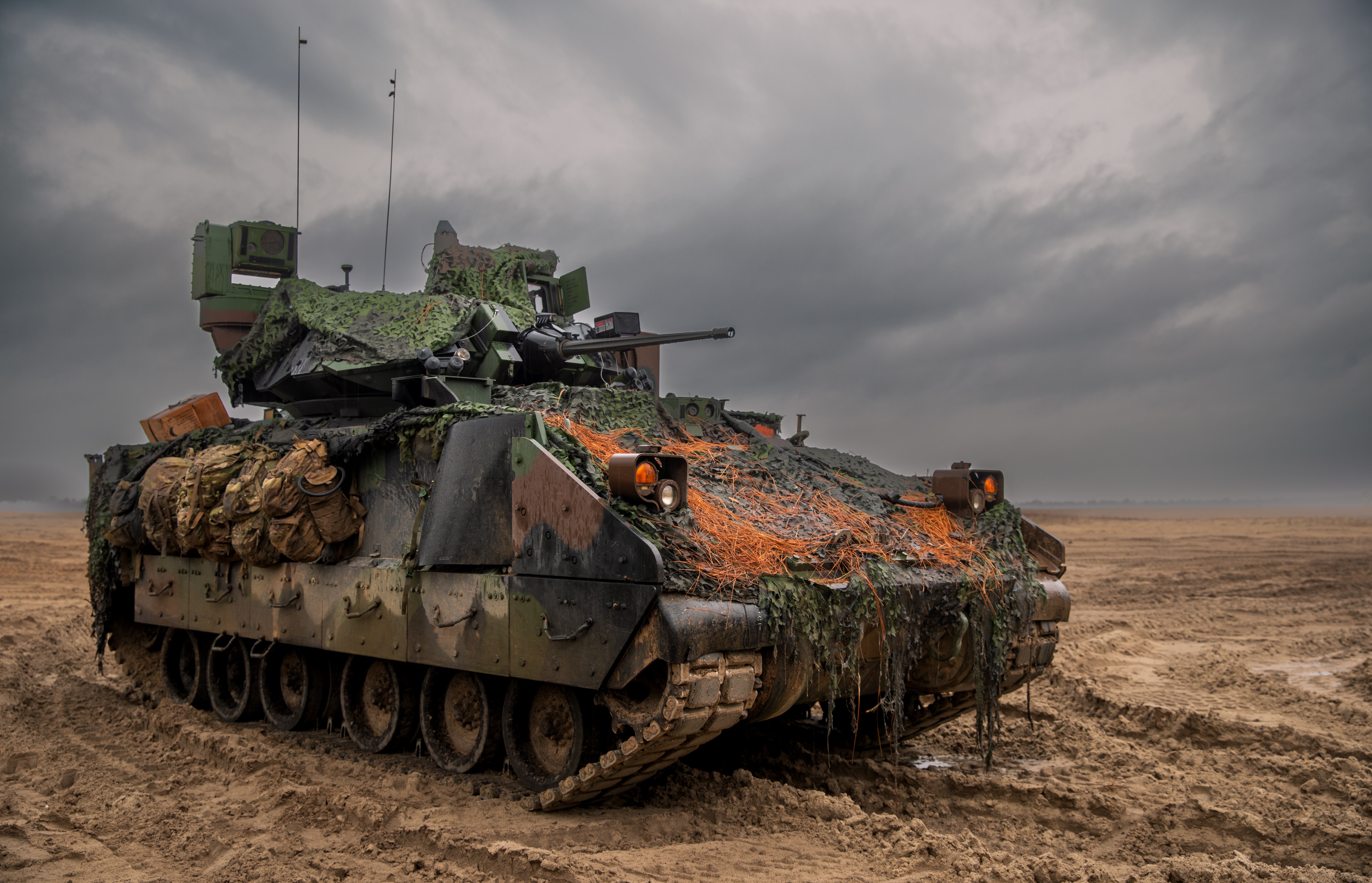 A Bradley Fighting Vehicle assigned to 2nd Battalion, 7th Infantry Regiment, 1st Armored Brigade Combat Team, 3rd Infantry Division, pulls security during a live-fire exercise (LFX) at Fort Stewart, Georgia, March 9, 2023. The LFX provides...