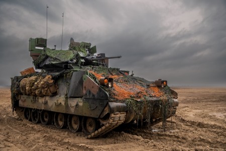 A Bradley Fighting Vehicle assigned to 2nd Battalion, 7th Infantry Regiment, 1st Armored Brigade Combat Team, 3rd Infantry Division, pulls security during a live-fire exercise (LFX) at Fort Stewart, Georgia, March 9, 2023. The LFX provides...