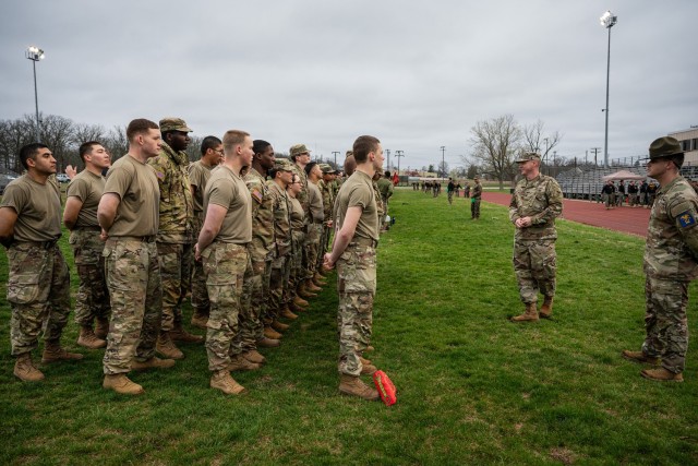 Soldiers in advanced individual training with Company D, 554th Engineer Battalion, get ready for the games to begin March 15 on Gerlach Field, during a celebration of St. Patrick, the patron saint of engineers, hosted by the Fort Leonard Wood...
