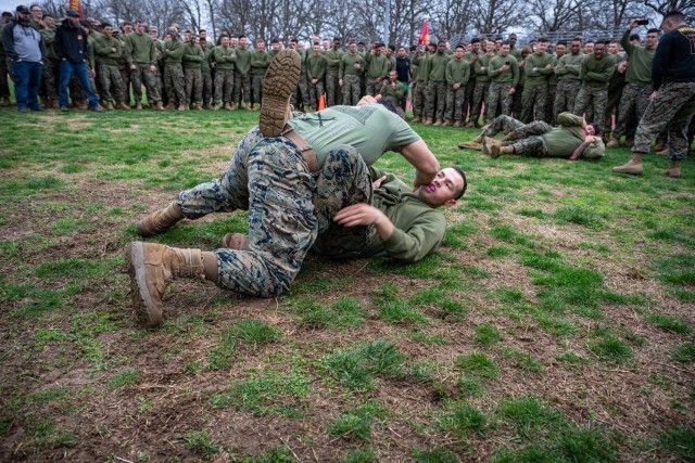 Marines participate in the ground-fighting competition event during a celebration of St. Patrick, the patron saint of engineers, hosted by the Fort Leonard Wood Marine Corps Detachment&#39;s Engineer Equipment Instruction Company, March 15 on...