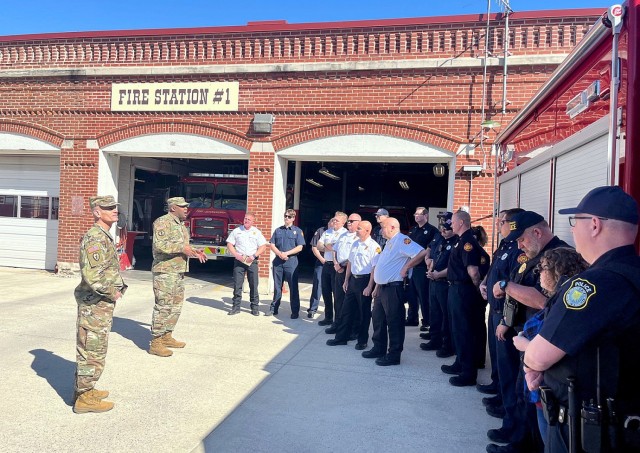 Installation Managment Command Commanding General Lt. Gen. Omar Jones and IMCOM Command Sgt. Maj. Jason Copeland visit with DES firefighters and Department of the Army police officers March 19 at Fire Station No. 1 at Fort Leavenworth, Kan. While...